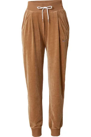 Nike Pantaloni con pieghe