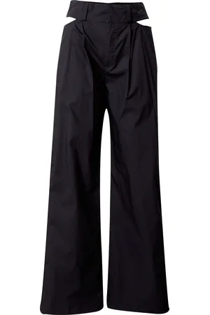 Nike Pantaloni con pieghe