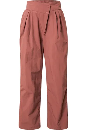 Nike Pantaloni con pieghe