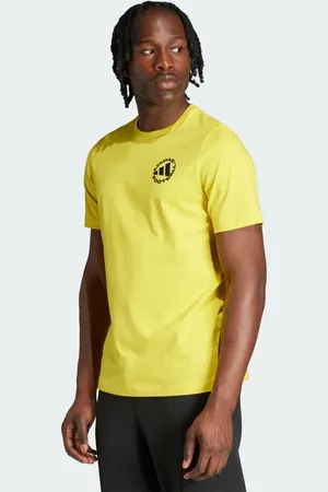 adidas T-shirt grafica con adesivi sul calcio