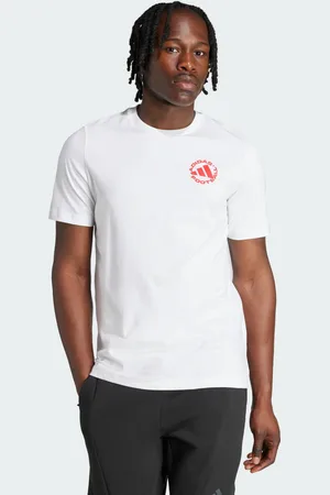 adidas T-shirt grafica con adesivi sul calcio