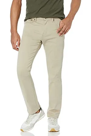 Amazon Jeans Elasticizzati con vestibilità Sportiva Uomo, , 33W / 30L