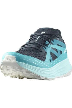 Salomon Ultra Flow Scarpe da Trail Running da Donna, Comfort immediato, Ammortizzazione dalla strada ai trail, A prova di terreni misti, Carbon/Peacock Blue/White, 44 EU