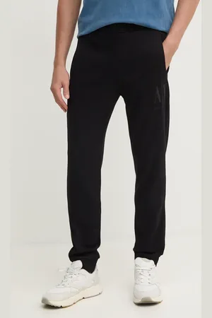 Armani Exchange Pantaloni della tuta di cotone colore con applicazione