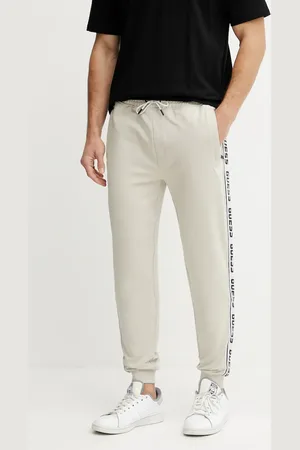 Guess Pantaloni della tuta colore