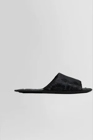 The Row WOMAN SANDALS & SLIDES