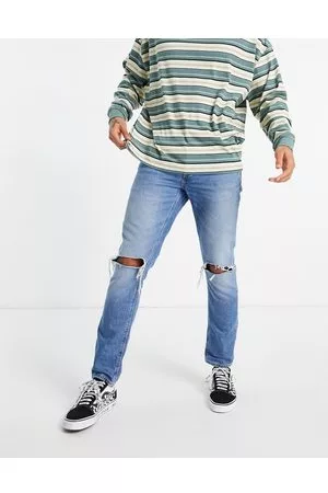 ASOS Jeans slim con strappi sul ginocchio lavaggio medio vintage