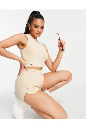 Aria Cove Crop top senza maniche in spugna avena in coordinato