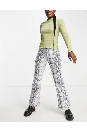 Topshop Jamie - Jeans a zampa bianchi con stampa pitonata