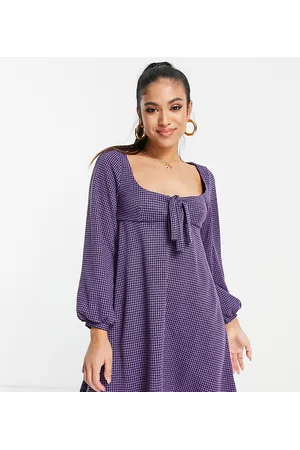 ASOS Petite ASOS DESIGN Petite - Vestito babydoll corto con laccetti e maniche lunghe con stampa pied de poule e nero