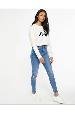 New Look Jeans a vita medio-alta con orlo sfrangiato