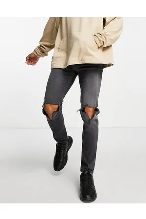 ASOS Jeans skinny slavato con strappi alle ginocchia