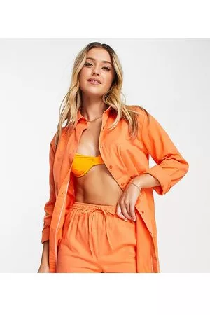 Esmée Esclusiva - Pantaloncini da mare arancioni in coordinato
