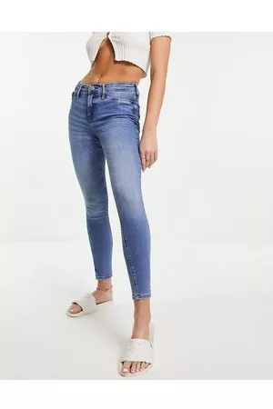 River Island Jeans skinny a vita medio alta, colore medio slavato