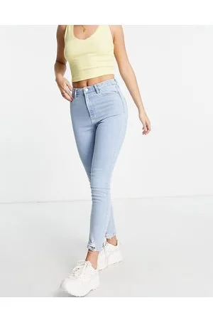 Miss Selfridge Lizzie - Jeans skinny con orlo sfrangiato lavaggio chiaro