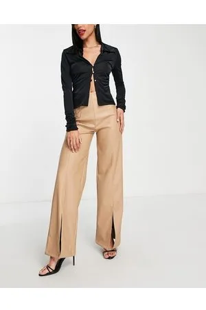 REBELLIOUS FASHION Pantaloni a fondo ampio in pelle sintetica color pietra