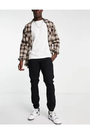 ASOS Jeans slim neri con fondo elasticizzato