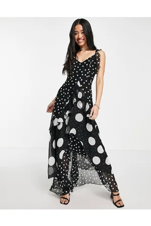 Style Cheat Vestito lungo con fondo asimmetrico a pois di dimensioni miste