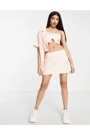 Miss Selfridge Minigonna in raso color pesca in coordinato