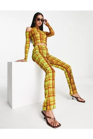 Topshop Pantaloni a zampa in tessuto a rete a quadri grunge in coordinato