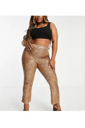 ASOS ASOS DESIGN Curve - Pantaloni a zampa da abito in jersey con paillettes rosa