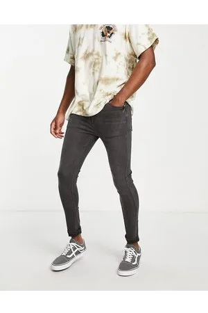 ASOS Jeans in power stretch slavato effetto spray