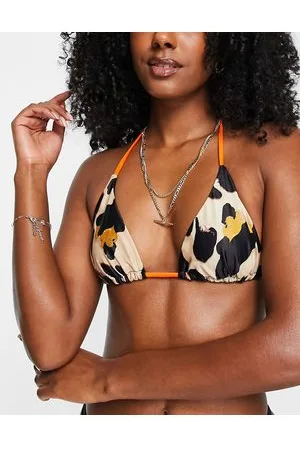 Never Fully Dressed Top bikini con stampa leopardata e laccetti a contrasto in coordinato