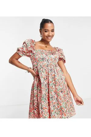 Collective The Label Esclusiva - Vestito grembiule strutturato in rete rosa con stampa