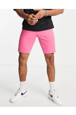 ASOS Pantaloncini slim in denim rosa acceso