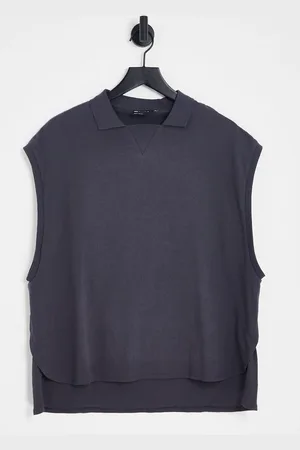 ASOS Polo oversize senza maniche con orlo asimmetrico slavato
