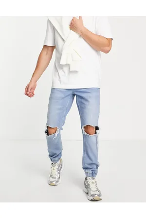 ASOS Jeans slim lavaggio chiaro con fondo elasticizzato