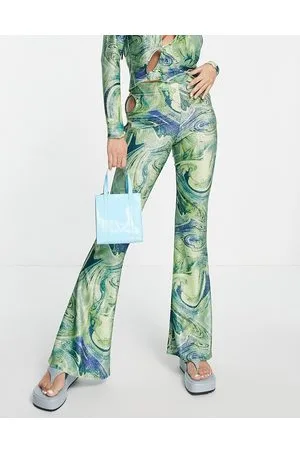Topshop Pantaloni a zampa con cut-out marmorizzato stile festival in coordinato