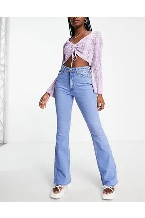River Island Jeans a zampa medio con fondo grezzo