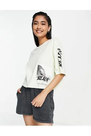 River Island T-shirt corta con stampa con graffiti, color lime