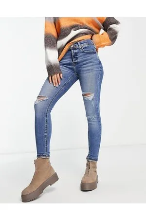 River Island Jeans skinny a vita medio alta scuro con strappi