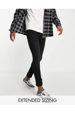 ASOS Jeans in power stretch slavato effetto spray