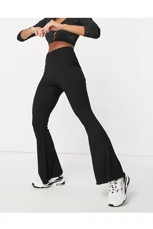 ASOS Pantaloni con fondo ampio e bordo ondulato neri a coste
