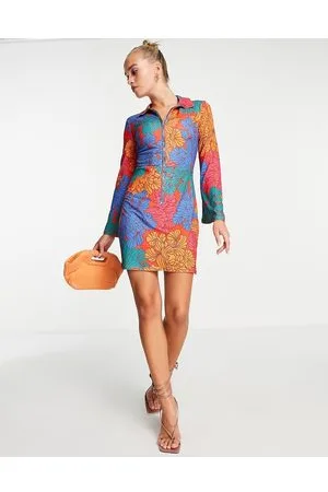 Never Fully Dressed Vestito corto con maniche svasate e zip con stampa a fiori astratti vivace