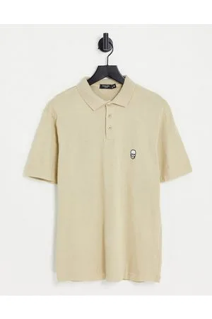 Bolongaro Polo color pietra con ricamo di teschio