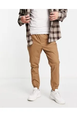 ASOS Chino stile joggers affusolati color pietra con girovita elasticizzato