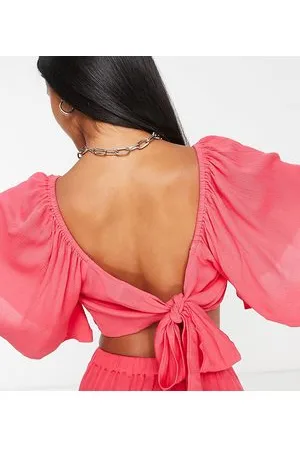 ASOS ASOS DESIGN Petite - Crop top da mare svolazzante con fiocco sul retro in coordinato