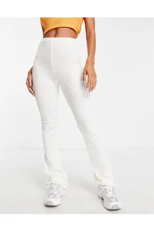 Topshop Pantaloni a zampa elasticizzati in velluto a coste écru