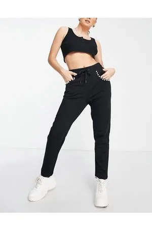 Moschino Joggers neri con finiture con perle e strass in coordinato