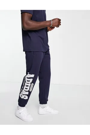adidas Preppy Varsity - Joggers oversize scuro con logo grande