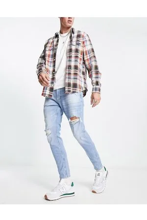 Pull&Bear Jeans carrot con strappi