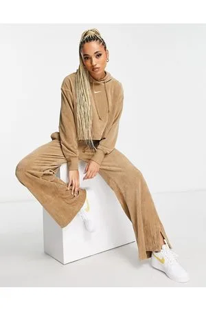 Nike Joggers a fondo ampio in velour a coste beige legno