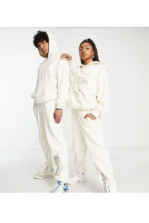 COLLUSION Unisex - Joggers écru con scritta stampata in coordinato - IVORY