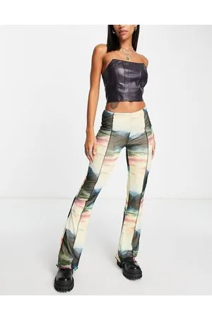 ONLY Neon & Neon - Pantaloni a zampa in rete con stampa astratta e orlo smerlato