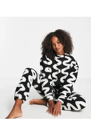 ASOS ASOS DESIGN Tall - Joggers da casa neri in pile borg con stampa stile scarabocchi in coordinato