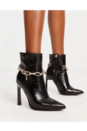 River Island Stivaletti neri a punta con catenina